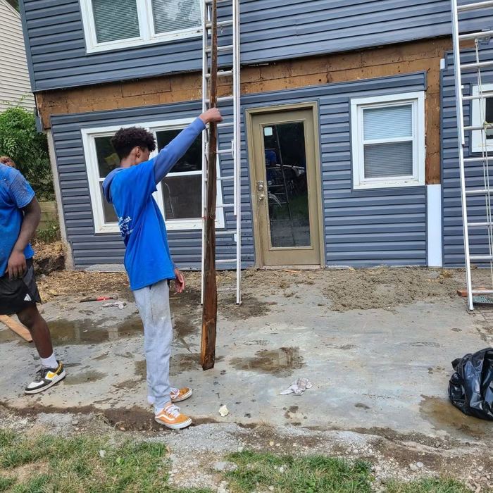 Crew trainee removing trim